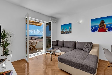 Chorvátsko, Promajna - apartmán Emili - obývacia časť s gaučom