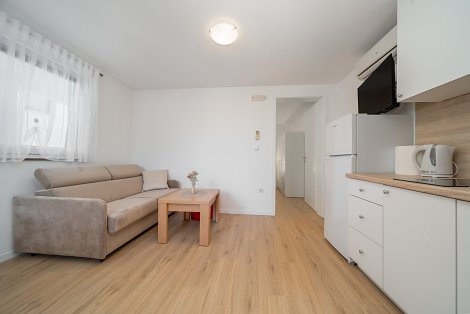 Chorvátsko, Baška Voda, apartmány Antunovič - apt. 1/2+2 na prízemí  s terasou - kuchyňa